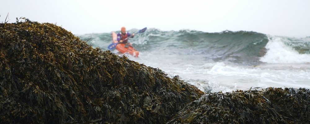 Sea kayaker in rough water